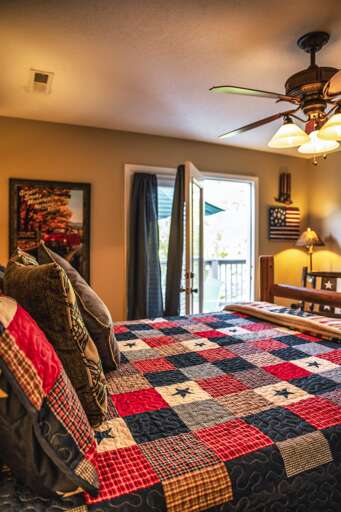 High N Dry - 2Bdr/2Ba In Pigeon Forge - Queen Bedroom with Deck Access High N Dry - 2Bdr/2Ba In Pigeon Forge - Queen Bedroom with Deck Access
