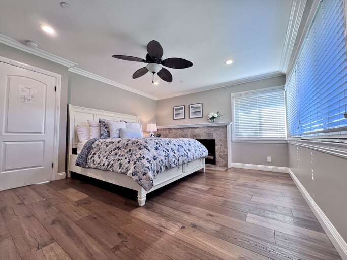 Spacious Sleeping Space With Sleek Surfaces And Soft Shades