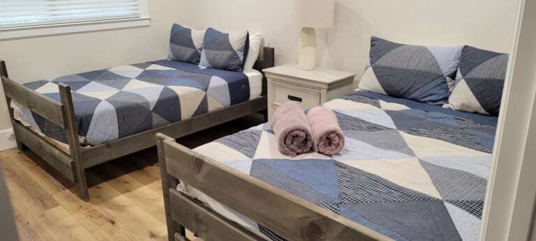 2 Full Beds Side by Side with access to Hallway Bathroom