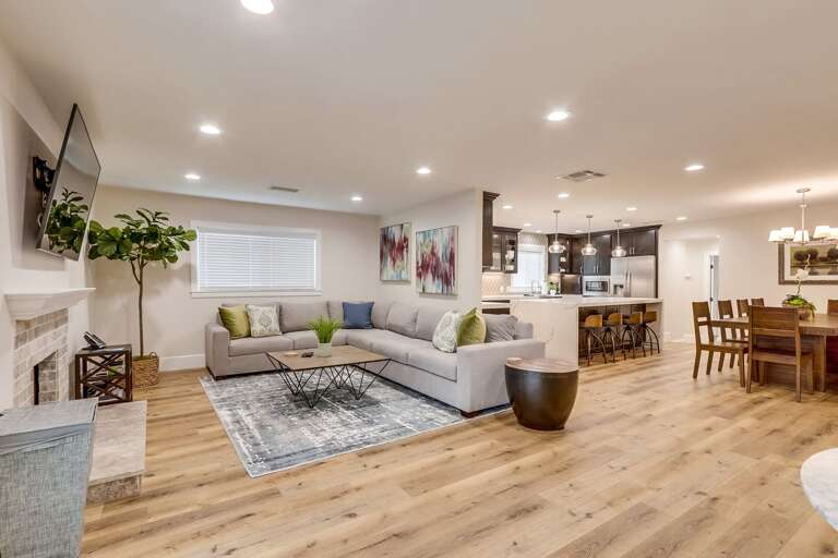 Spacious Split-space Setup Showcasing Sitting, Dining Domains