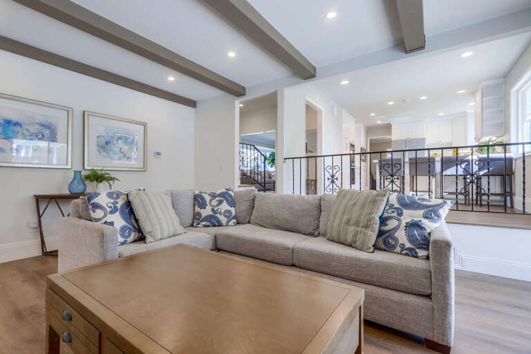 Family Room view looking into Kitchen and Living Room