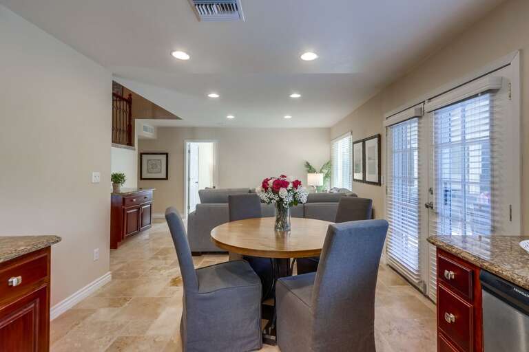 Kitchen with Breakfast table looking into Family Room