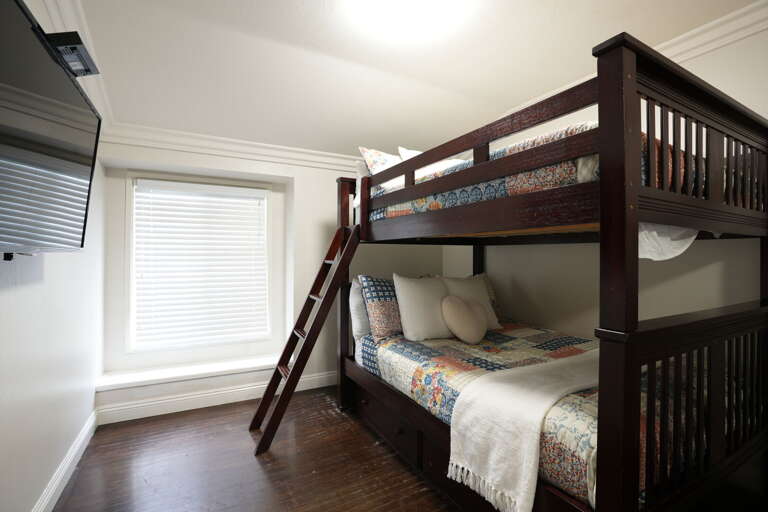 Bedroom #5 Full over Full Bunks with TV. Mirror wardrobe closet
