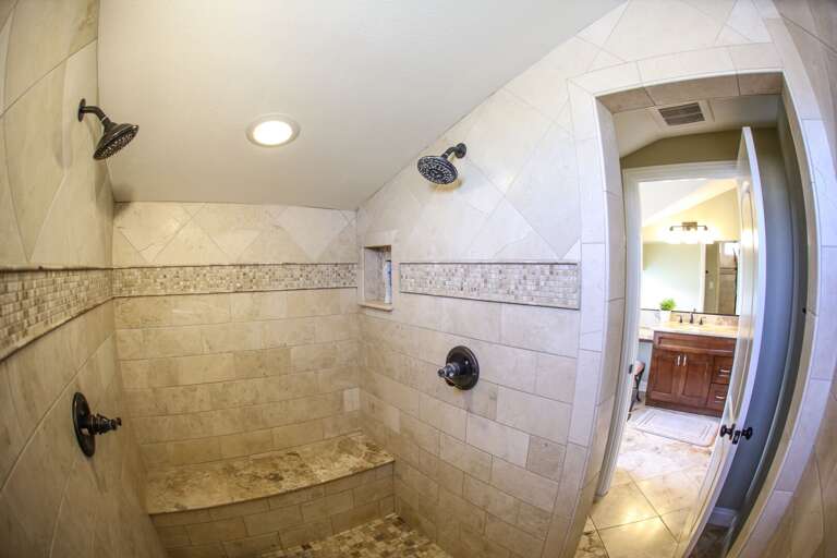 Beige Bathroom With Built-in Shower And Tiled Walls Beige Bathroom With Built-in Shower And Tiled Walls