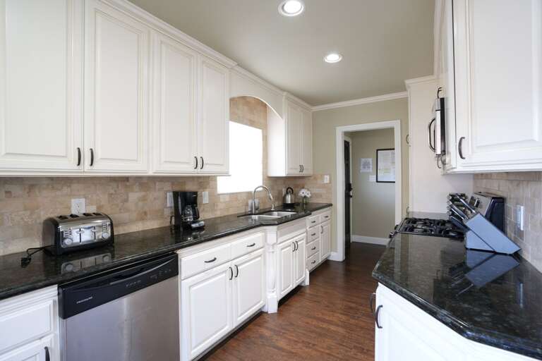 Upgraded Kitchen with stainless steel appliances and granite countertops