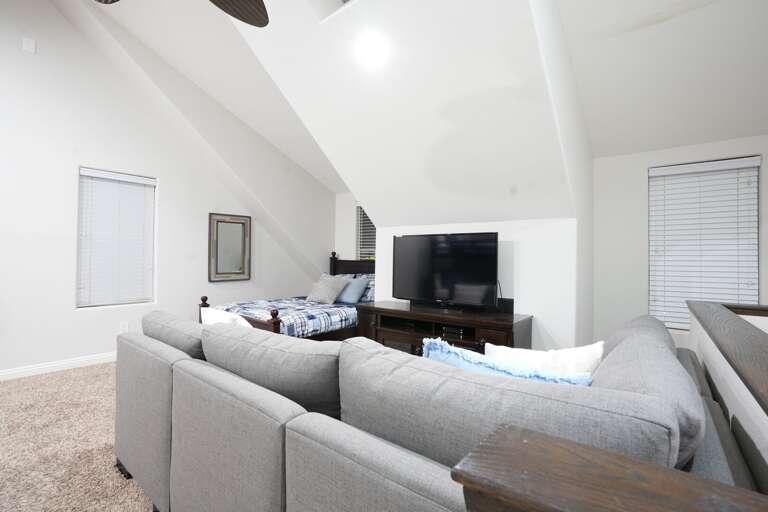 Loft features a Full over Full Bunkbed and an additional Full Bed.