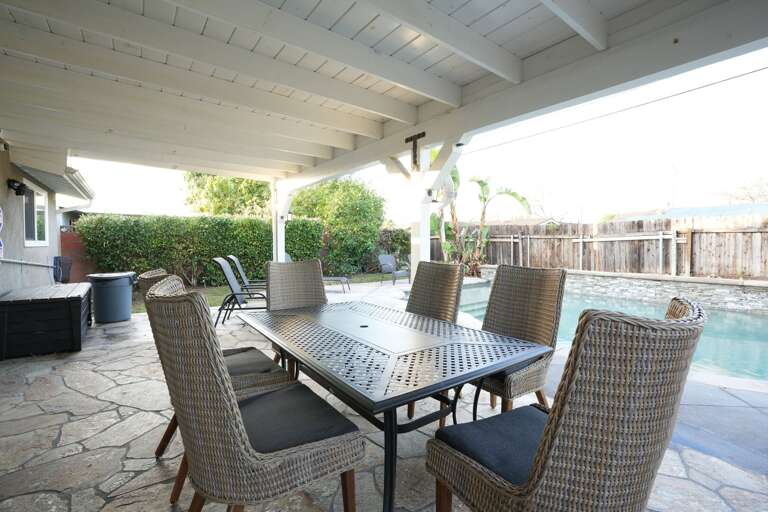 Outdoor Covered Patio Dining with Gas Grill