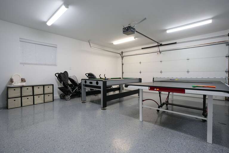 Spotless Spacious Garage With Table Tennis And Workbench