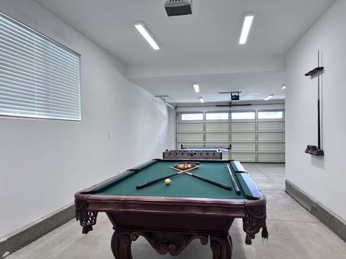Recreation Room With Billiards Table In Bright, Spacious Vacation Rental