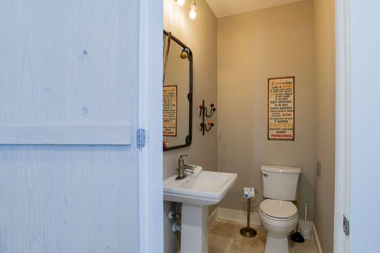 Half Bath on third floor off the den, beside the bunk room.