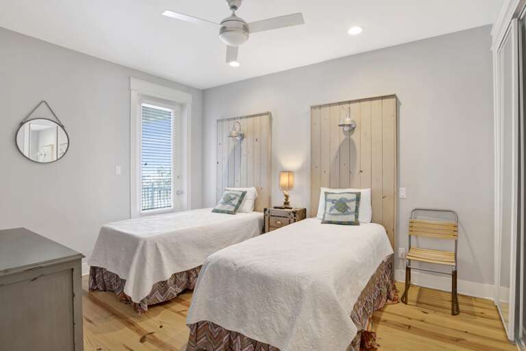 2nd Level- Two Twin XL Beds located on North East side of house with access to north balcony.