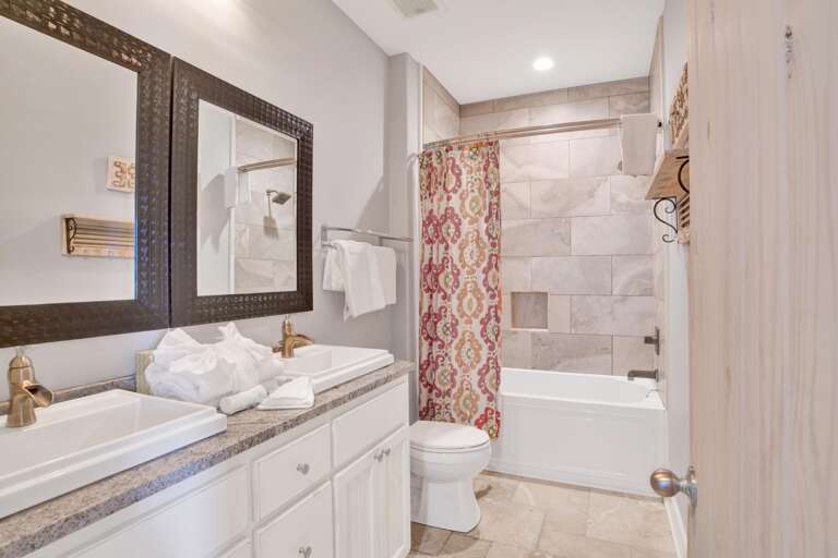 Full bath directly across the hall from bunk room.