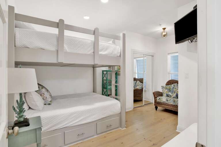 Queen over Queen Bunks. (sleeps 4)