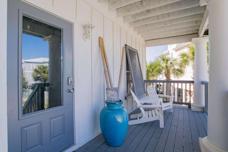 Front porch main level overlooking pool.