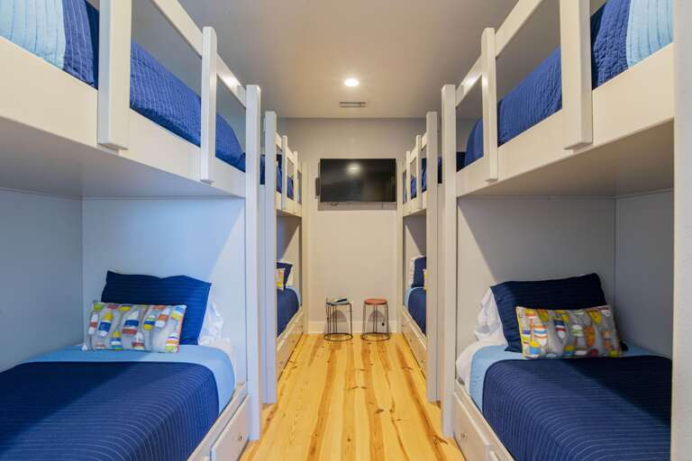 8 Twin XL beds. Can accommodate children or adults.