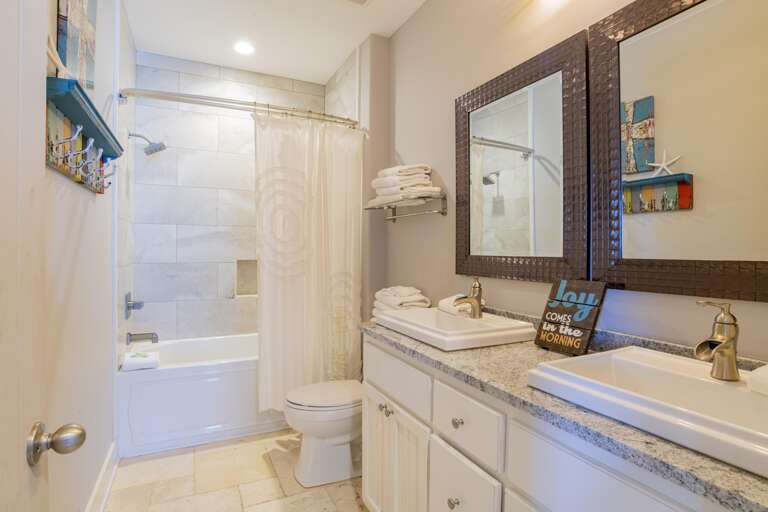 Both Bunk Rooms Share this bath and a half bath off 3rd floor den.