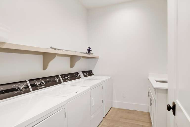 2nd Floor. 2 sets of full sized washer and dryers. Off the game room on second floor.