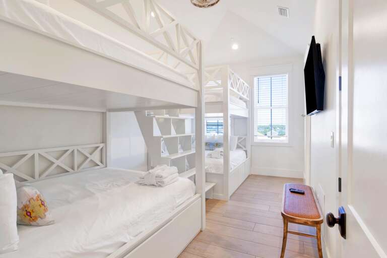 Bedroom 11 on 3rd floor - top level. Has two sets of queen over queen bunks, sleeps up to 8.