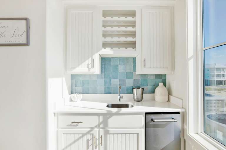Wet bar with under-counter ice maker off kitchen
