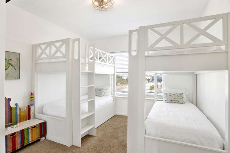 New custom bunks with Twin XL over Twin XL - Sleeps 4 (one of these rooms is on each side of the property.)