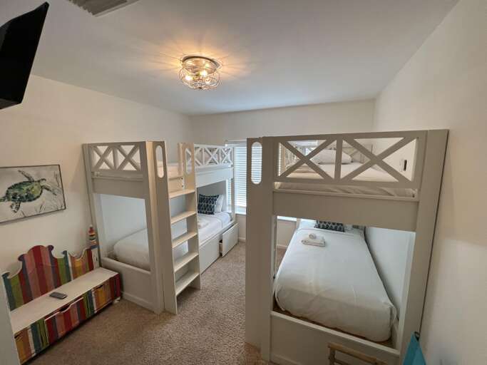 New custom bunks with Twin XL over Twin XL - Sleeps 4 (one of these rooms is on each side of the property.)