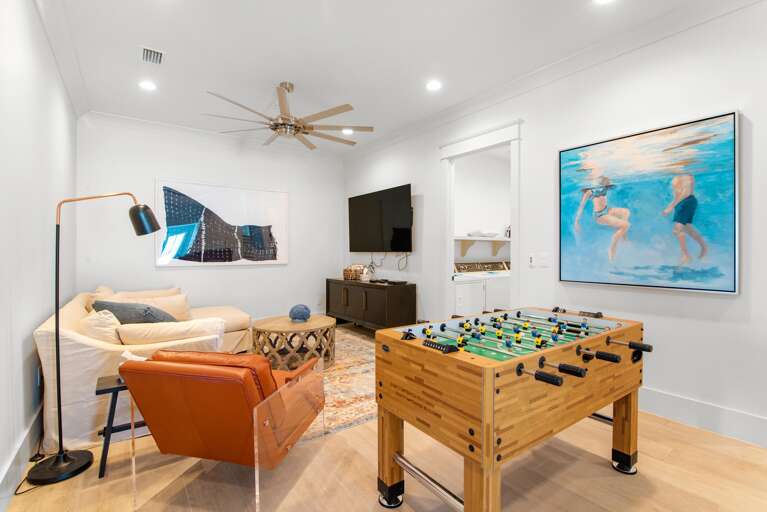 2nd Floor den with 75Inch Smart TV and Foosball Table