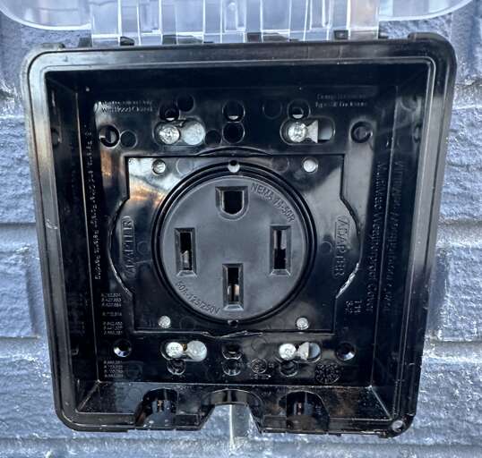 Shared 50 Amp / 240V / 14-50 Heavy-Duty Receptacle for Level 2 EV Charging.