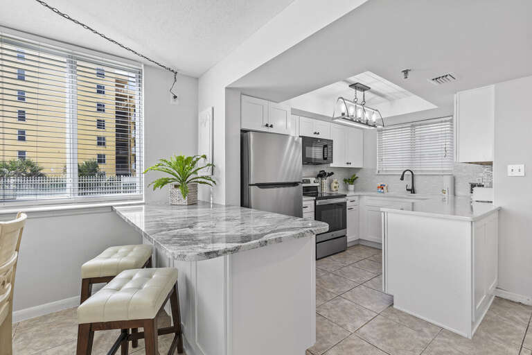Polished Kitchen, Pristine Counters, Pleasingly Placed In A Vacation Rental