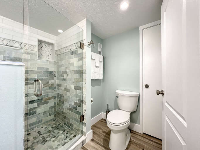 With a walk-in shower, designed for ultimate relaxation and rejuvenation.
