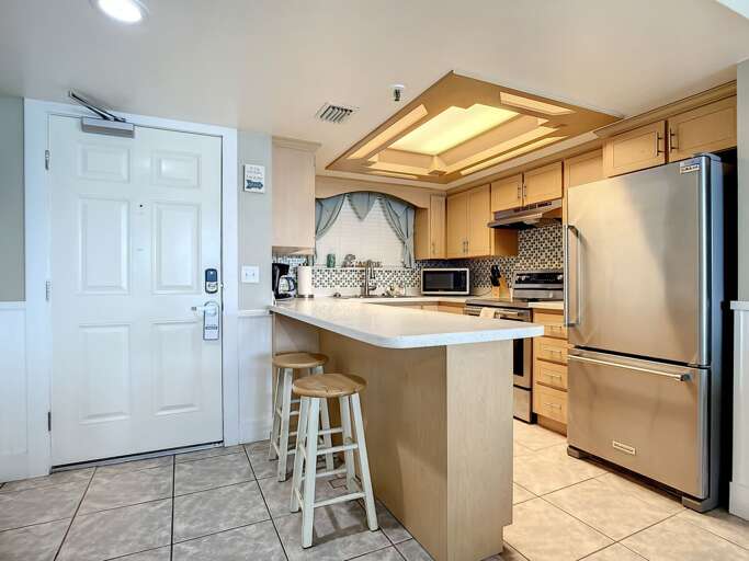 Cook with ease in our fully equipped kitchen, featuring new appliances that make meal preparation a breeze Cook with ease in our fully equipped kitchen, featuring new appliances that make meal preparation a breeze