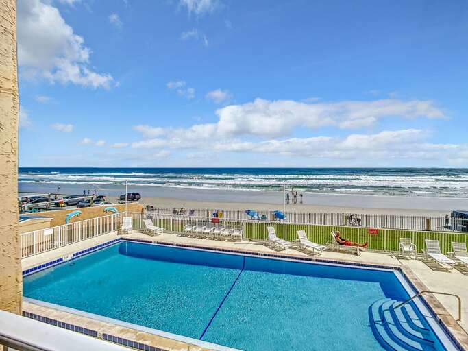 Enjoy ocean and pool views from the comfort of your balcony retreat. Enjoy ocean and pool views from the comfort of your balcony retreat.