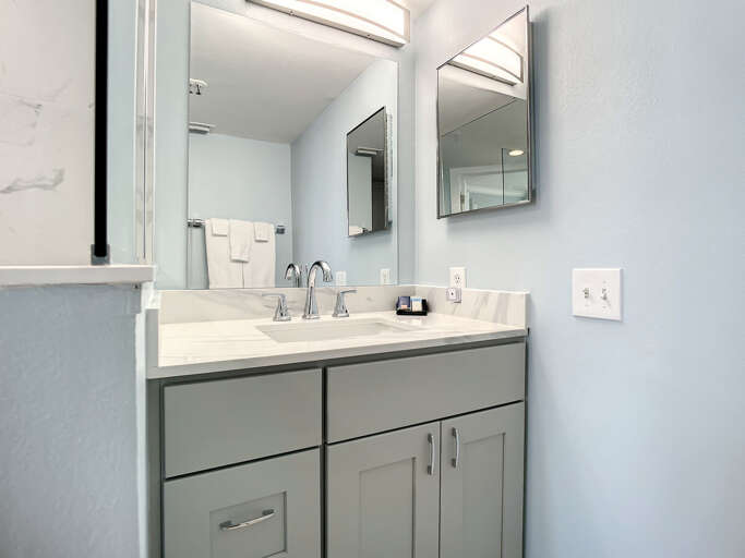 Our master bathroom features a walk-in shower with a soothing rainfall shower head. Our master bathroom features a walk-in shower with a soothing rainfall shower head.