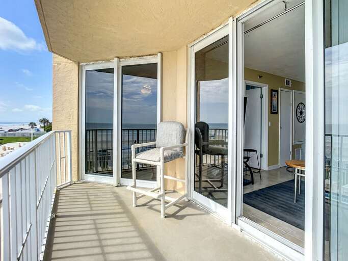 Step onto the balcony and take in the breathtaking views of the pool and ocean. Step onto the balcony and take in the breathtaking views of the pool and ocean.
