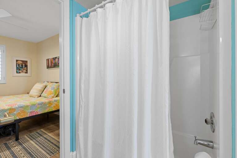 Convenience meets comfort! Enjoy easy access to the guest bathroom with a convenient shower-tub combo.