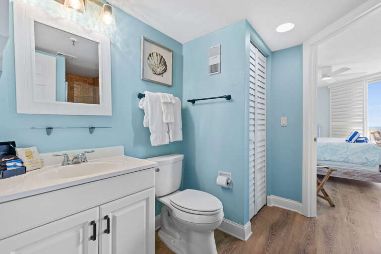 Indulge in luxury! The private master bathroom features a spacious walk-in shower for ultimate relaxation.