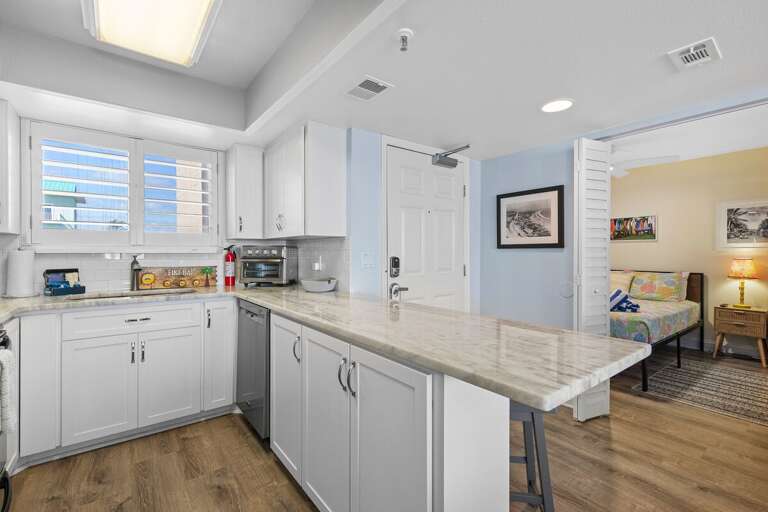 Newly renovated and ready for you! Our kitchen boasts a breakfast bar for added convenience and style.