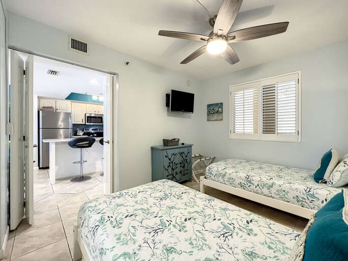 Perfect for guests! The guest bedroom offers two twin beds, ensuring a comfortable stay for friends or family.