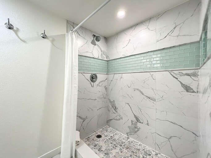 Brand-new walk-in shower. Brand-new walk-in shower.