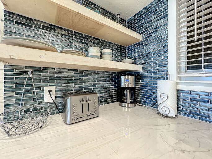 Toaster and full-size coffee maker. Toaster and full-size coffee maker.
