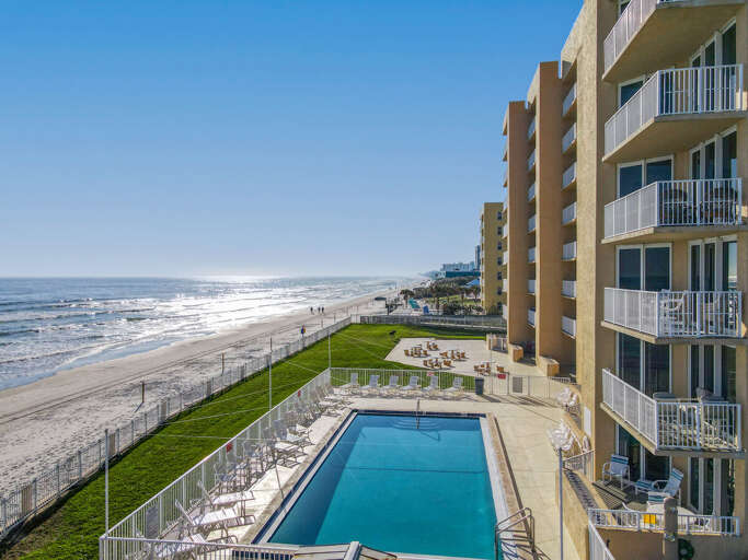 View of pool and ocean. View of pool and ocean.