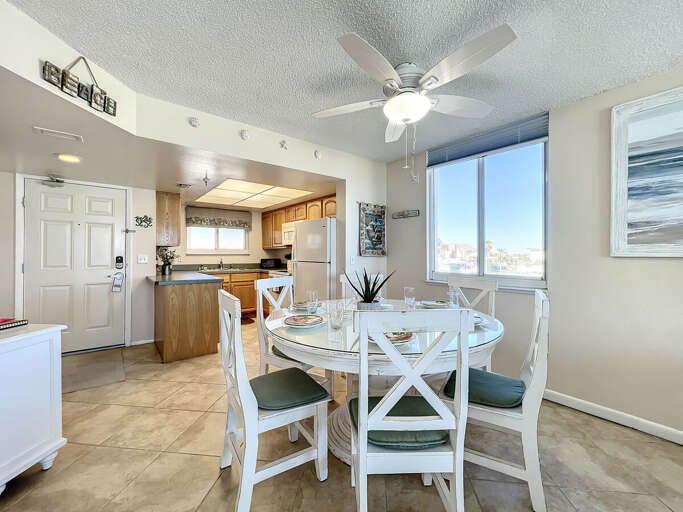 View of dining room looking into kitchen.