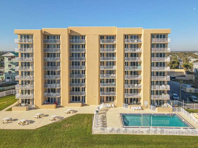 Oceania Plaza back view showing our pool and ocean front properties. Oceania Plaza back view showing our pool and ocean front properties.