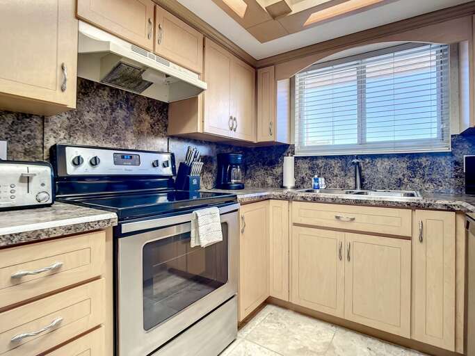 Flat top stove and toaster.