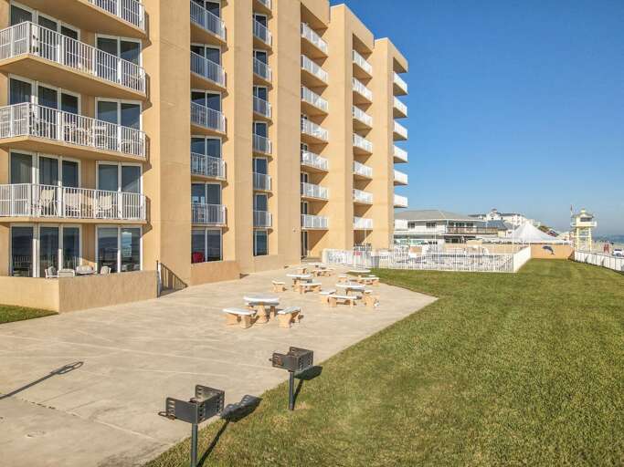 Charcoal grills available by the picnic tables.