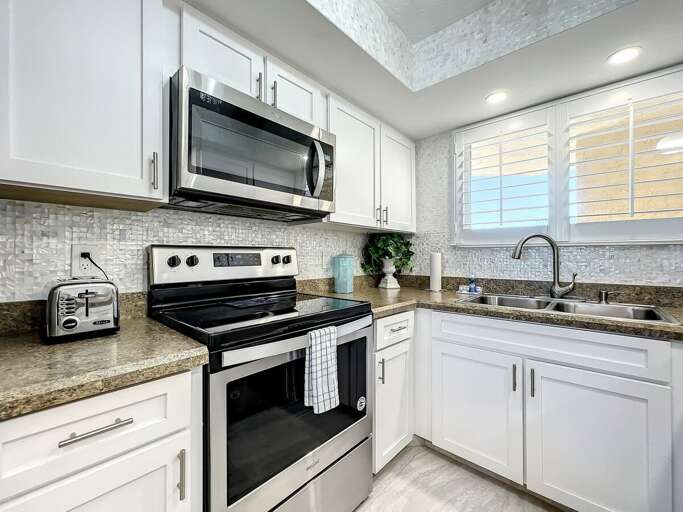 Flat top stove with microwave.