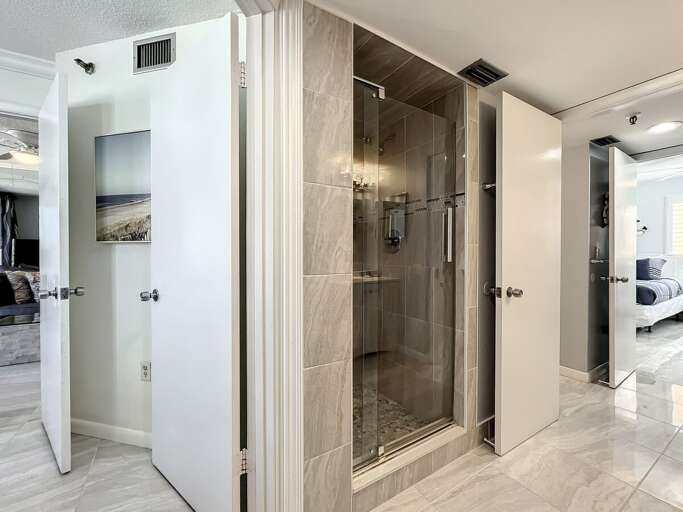 Walk in shower. Access to master bedroom and guest bathroom.