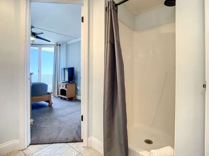Walk in shower. Access to master bedroom.