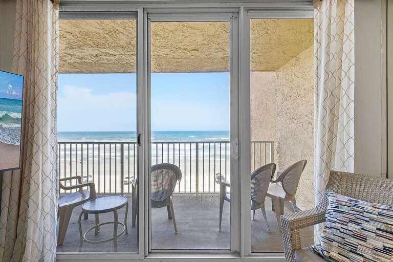 Take in breathtaking ocean views from this private balcony with comfortable seating. This beach stay offers the perfect spot to relax, enjoy the sea breeze, and unwind just steps from the sandy shore.