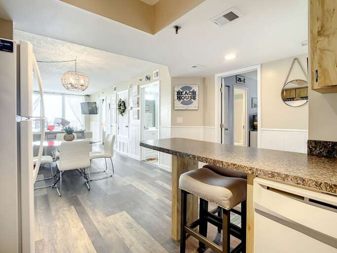 Breakfast bar with extra seating. Built in dishwasher.