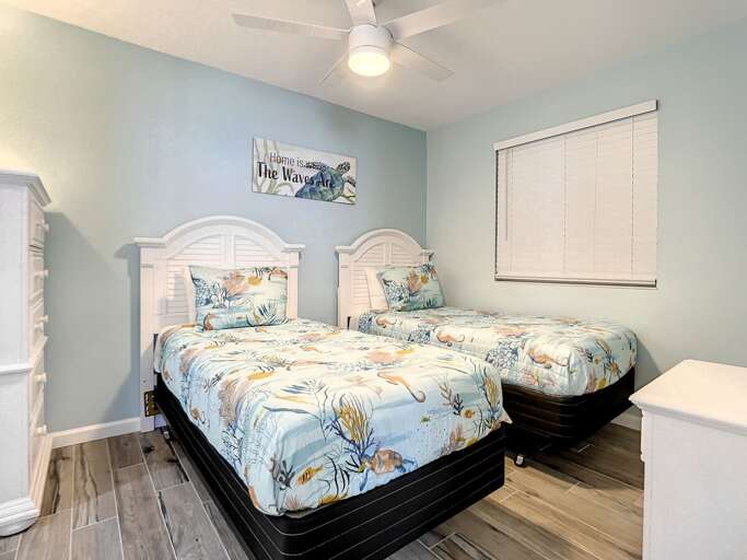 2 Twins with dresser for storage.